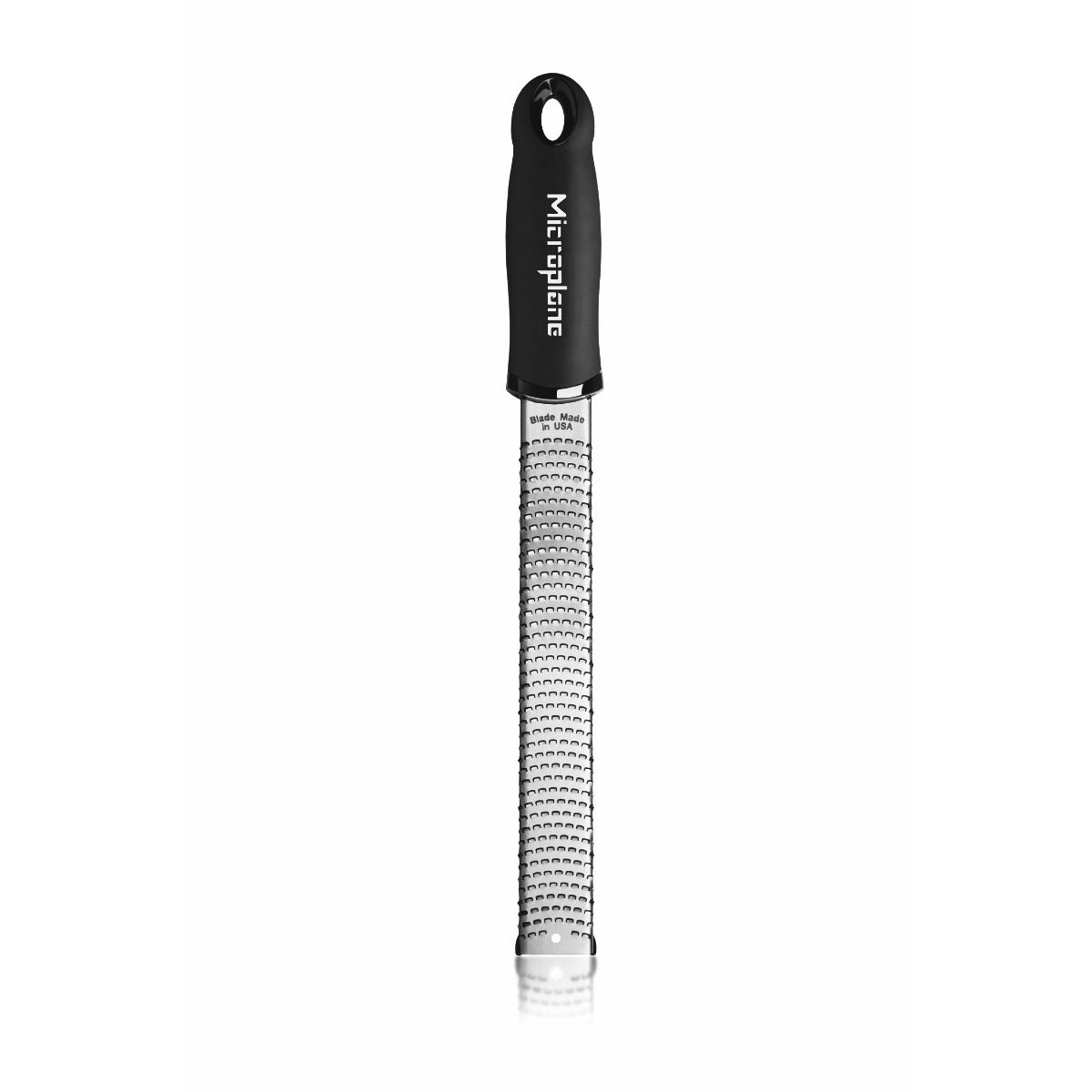 Microplane Premium Classic Series Zester Grater in black with long photo-etched stainless steel blade and soft-grip handle
