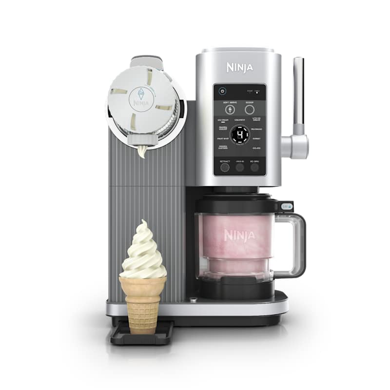 Ninja Swirl by CREAMi NC701 countertop ice cream and soft serve maker in silver and black with a soft serve dispensing handle and two 16oz pints