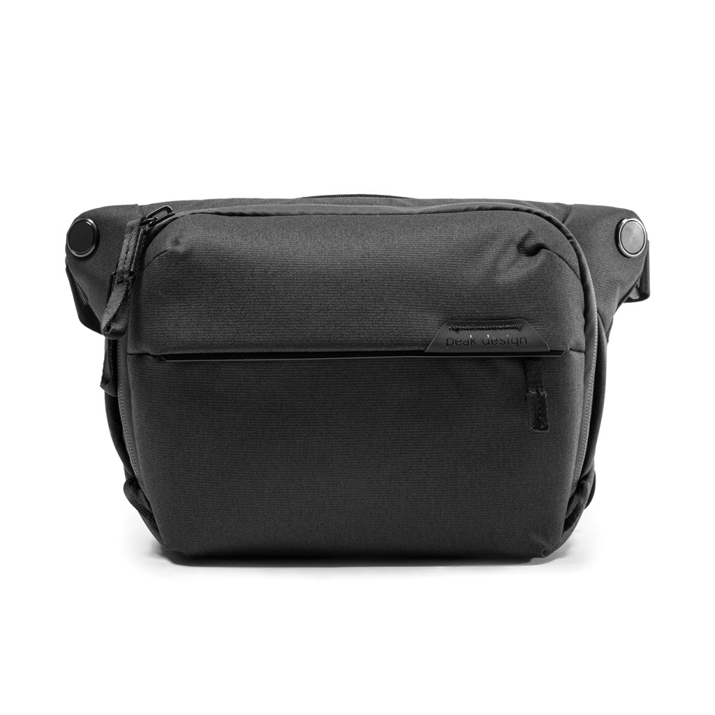 Peak Design Everyday Sling 6L in black with weatherproof recycled nylon shell, top UltraZip, and padded adjustable crossbody strap