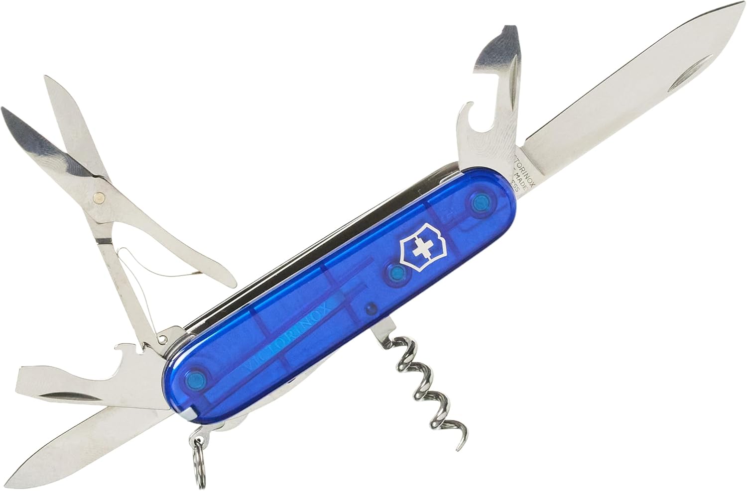 Victorinox Huntsman Swiss Army Knife in red with multiple tools fanned out showing scissors, blade, and saw